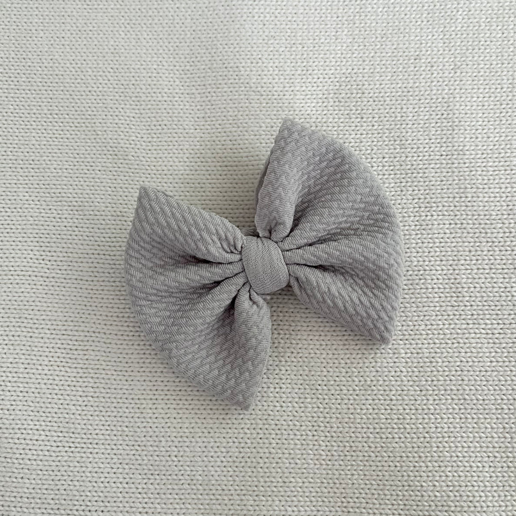 Grey bow clip